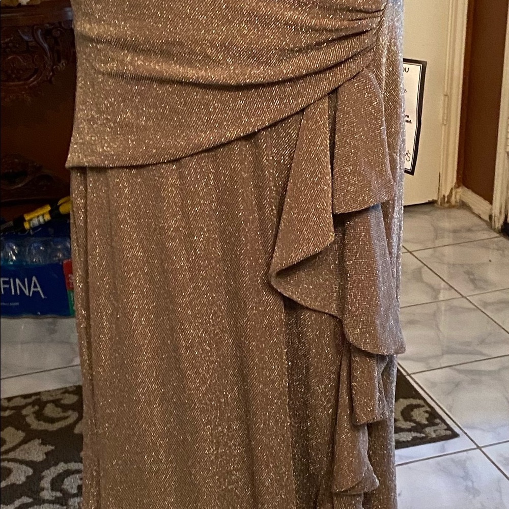 Long Bronze elegant dress with sexy open slip.